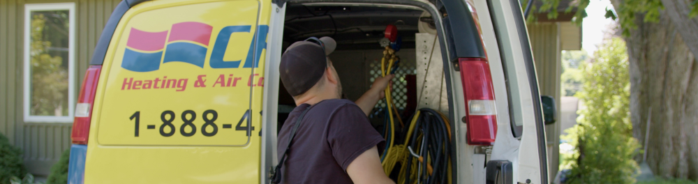 A Cross Heating & Air Conditioning Technician arrives on site to begin the installation of a whole-home humidifier.